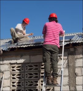 SUNY Broome students install solar panels in Haiti.